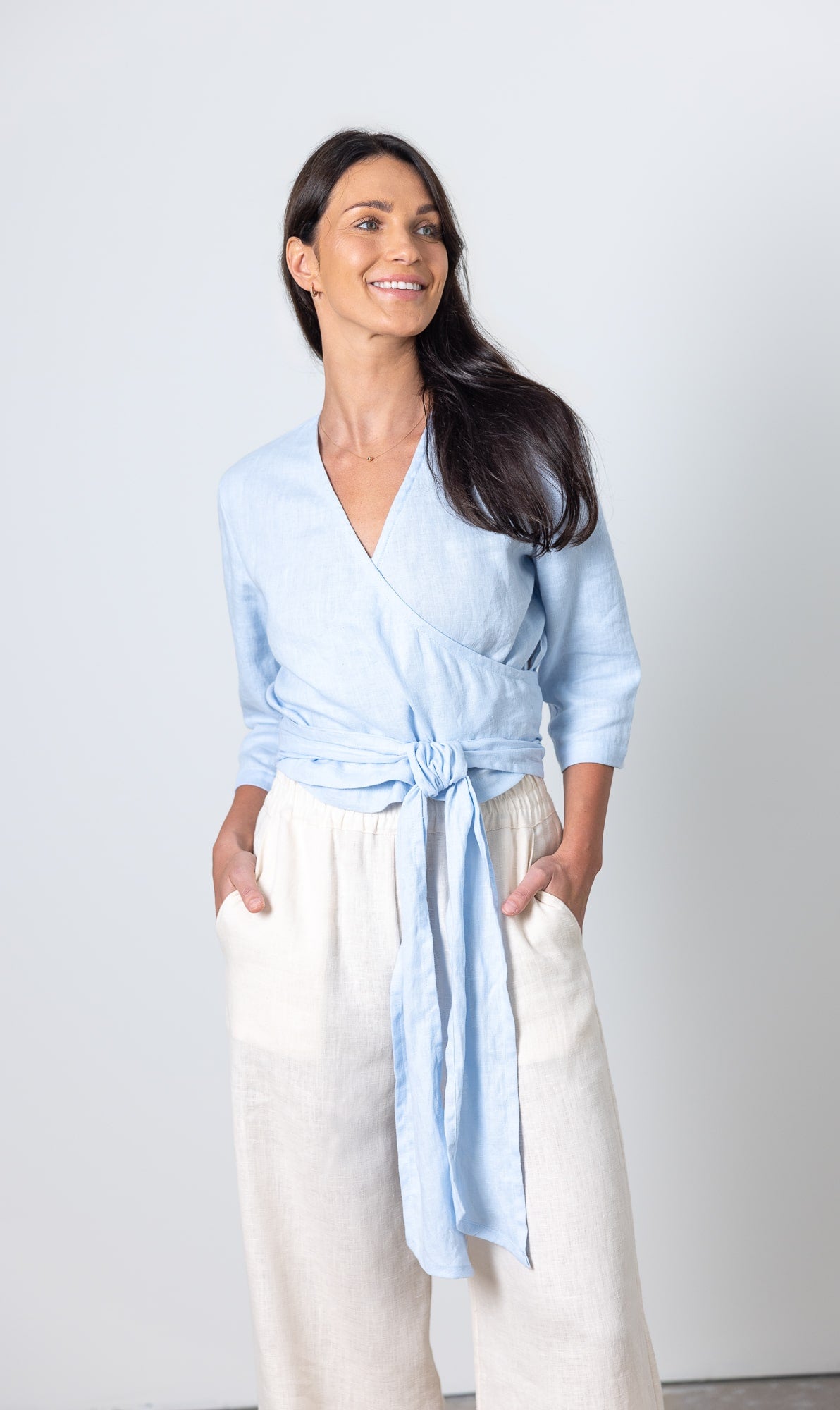 Esmeralda linen wrap blouse in blue, perfect summer top with elegant silhouette