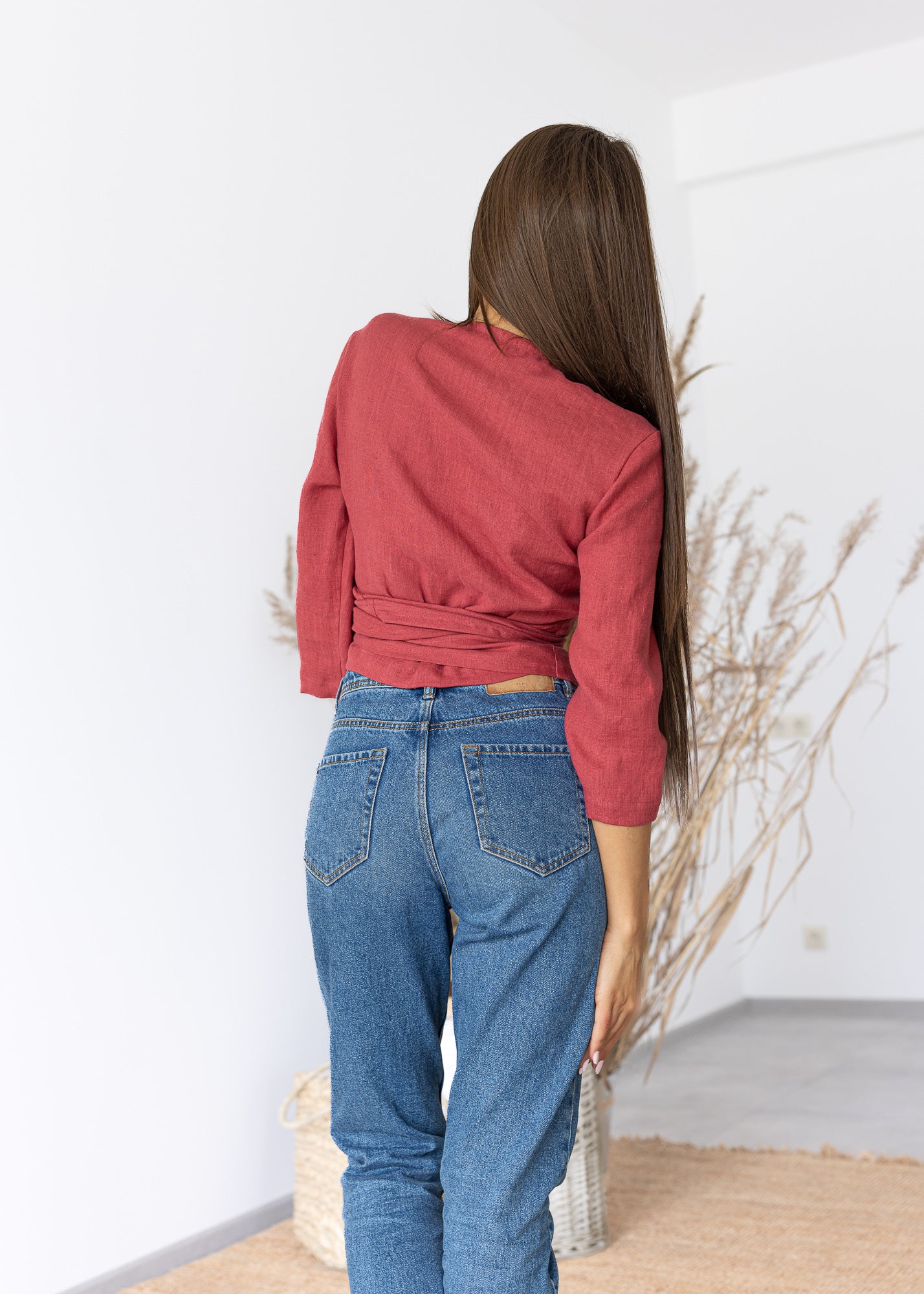 Belted red wrap top