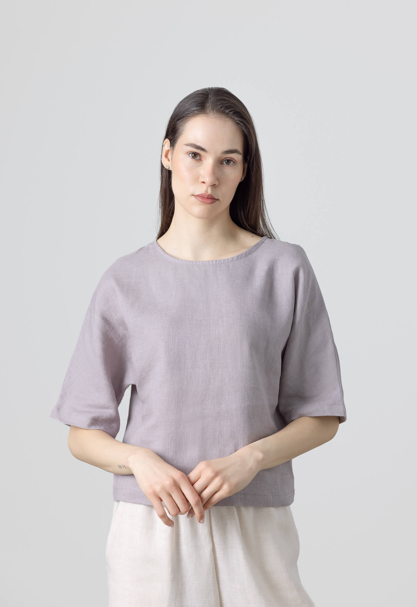 Lightweight linen summer crop top with a modern boxy silhouette for warm weather styling