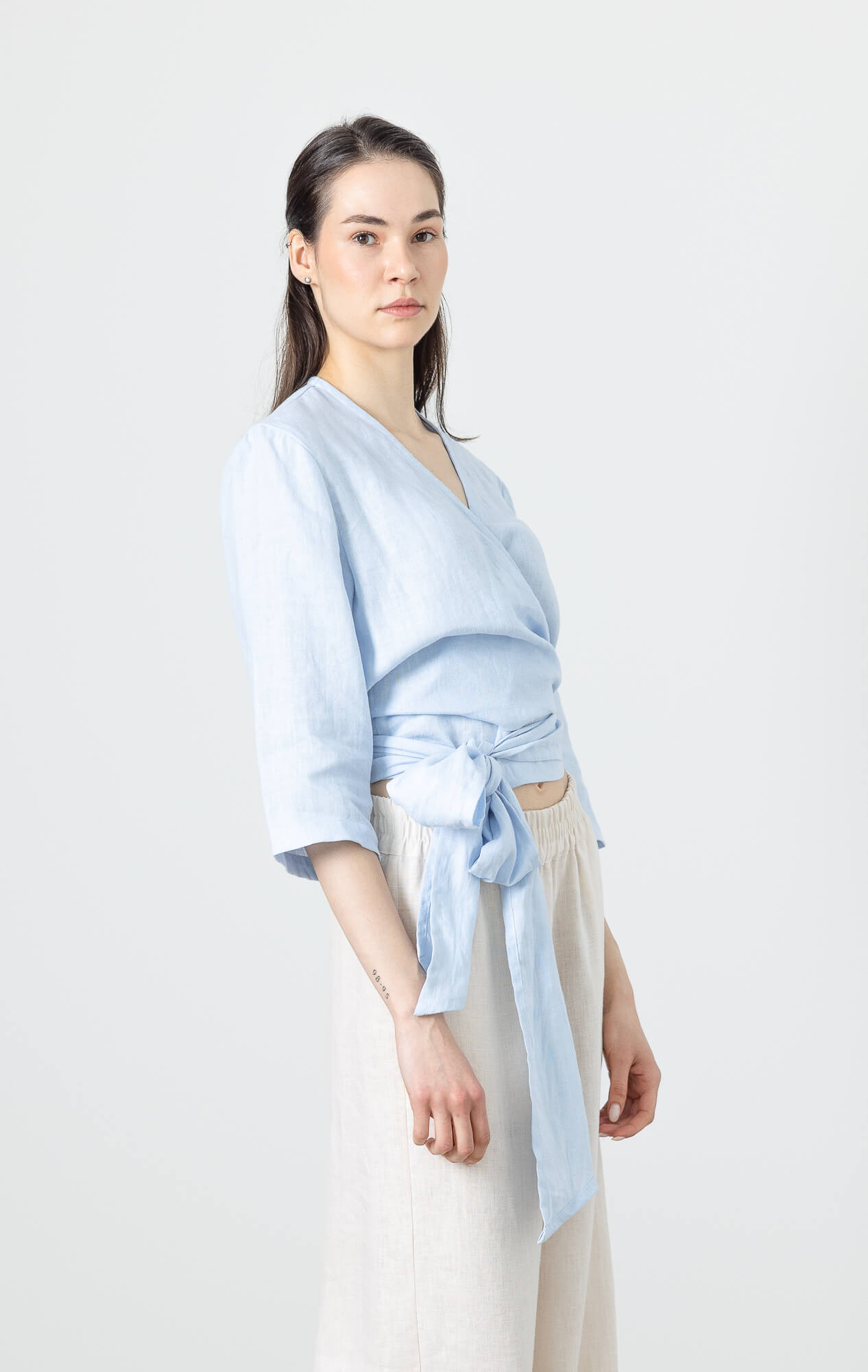 Elegant women’s linen wrap shirt with soft Scandinavian aesthetic