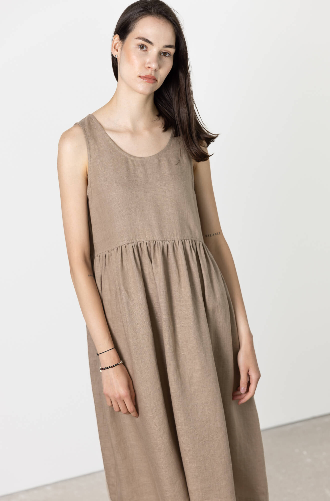 Brown linen midi dress for women with sleeveless design and relaxed fit