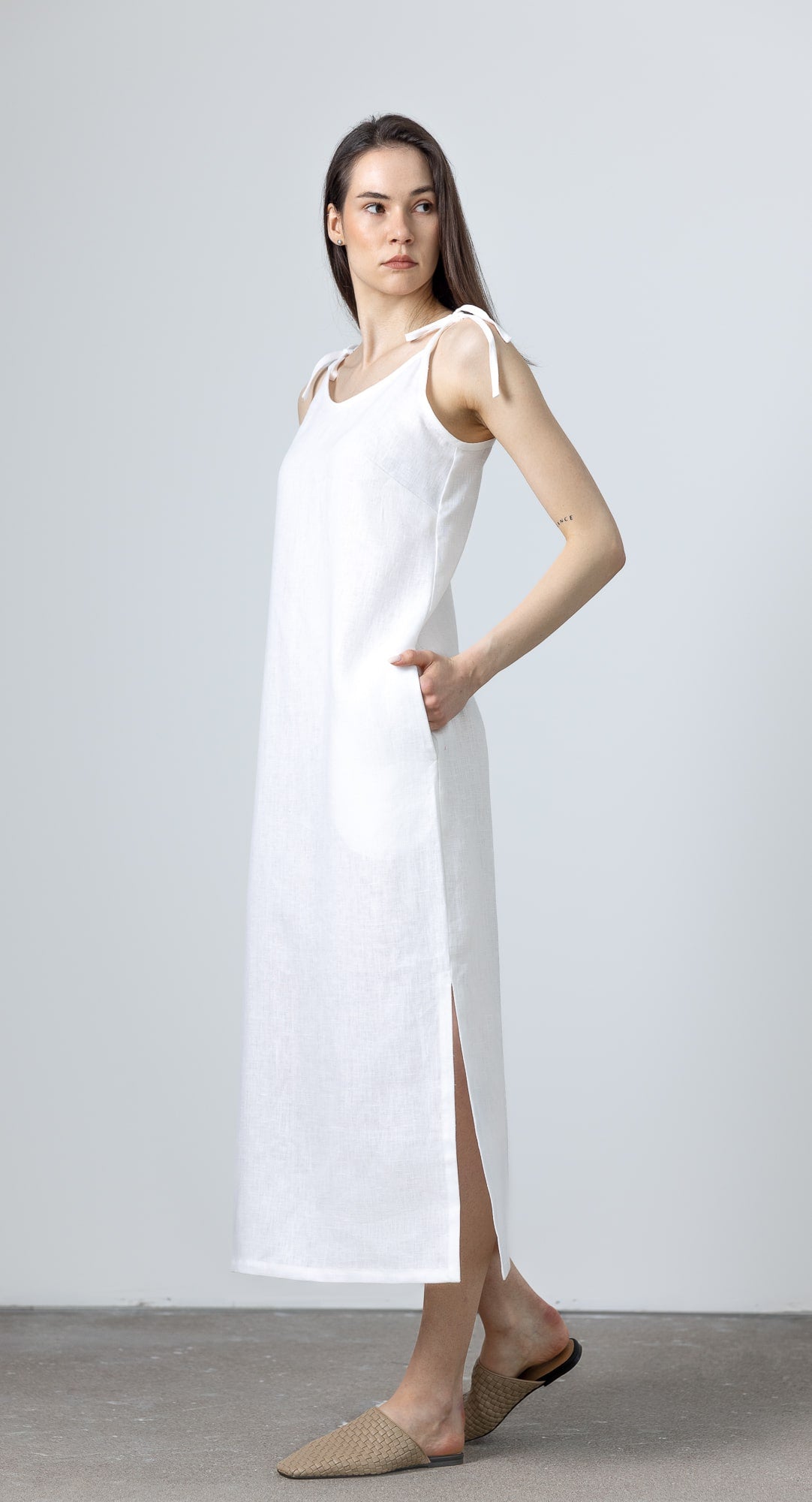 Elegant MINIMALISTICLINEN White Linen Slip Dress Monserrat worn as a women’s white linen dress with breezy tie straps