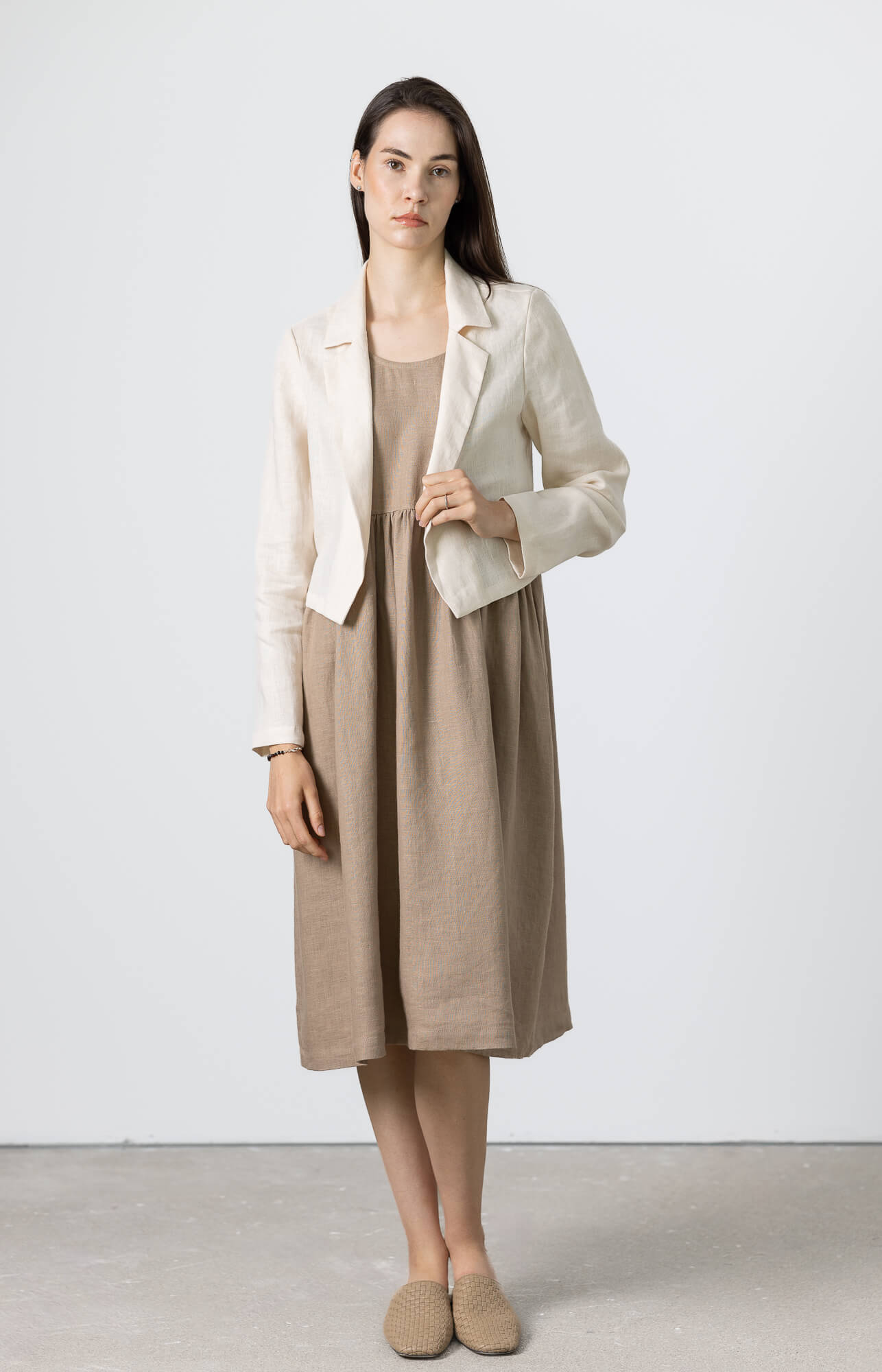 Elegant linen cropped jacket layered with a linen dress