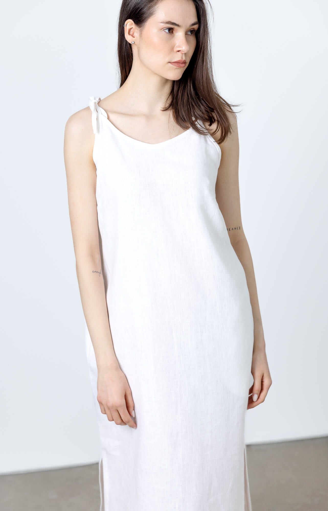 Minimal white linen slip dress for casual and elegant outfits