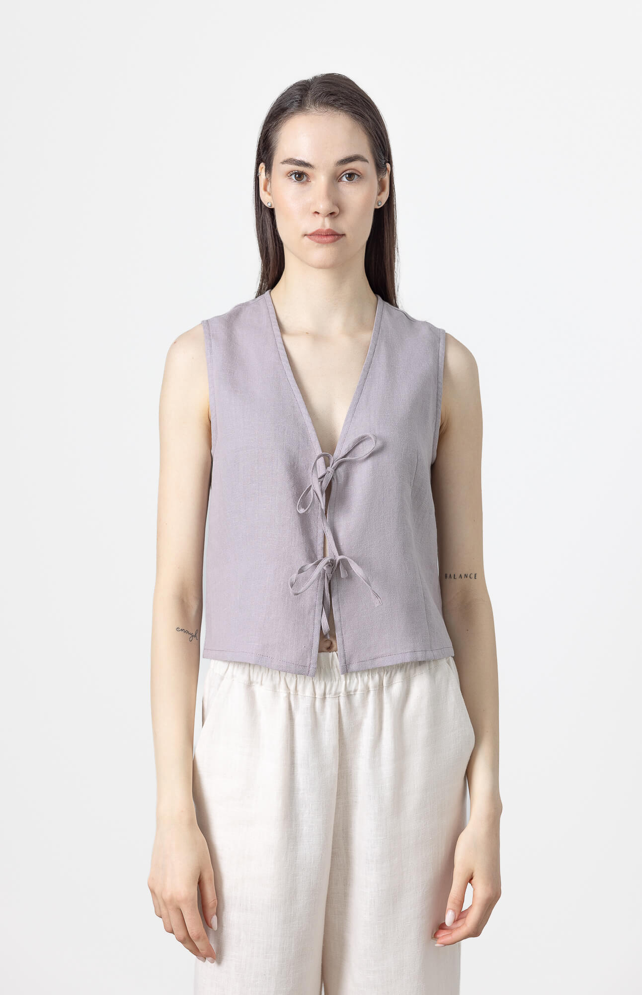 Women's sleeveless linen vest with adjustable tie front closure