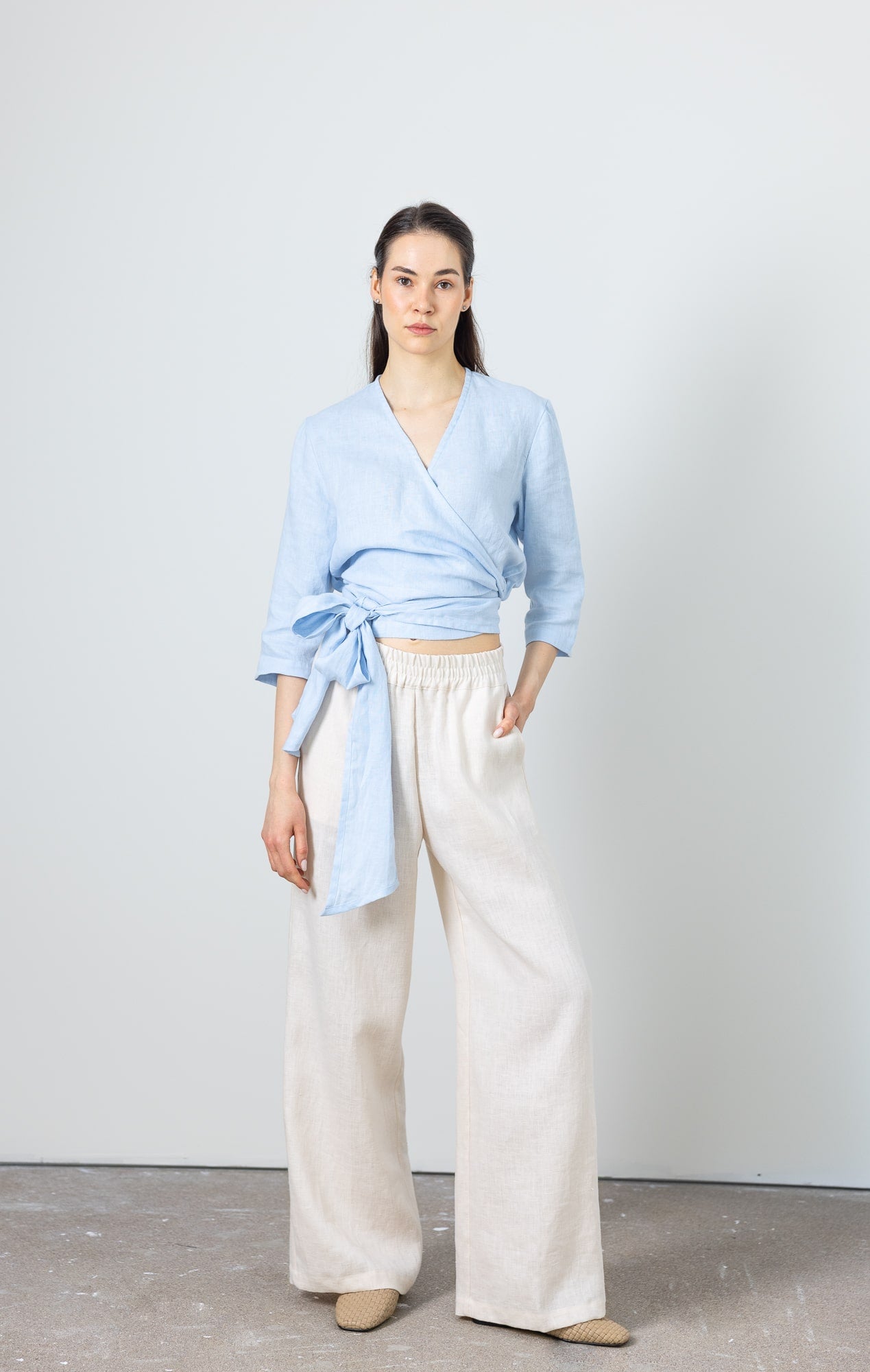 Elegant blue linen wrap top with wide tie detail – feminine and timeless summer look