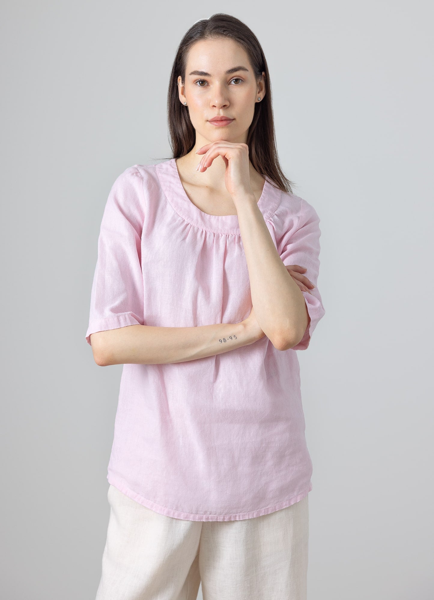 Ladies linen blouse with gathered neckline and soft elbow sleeves in pastel pink