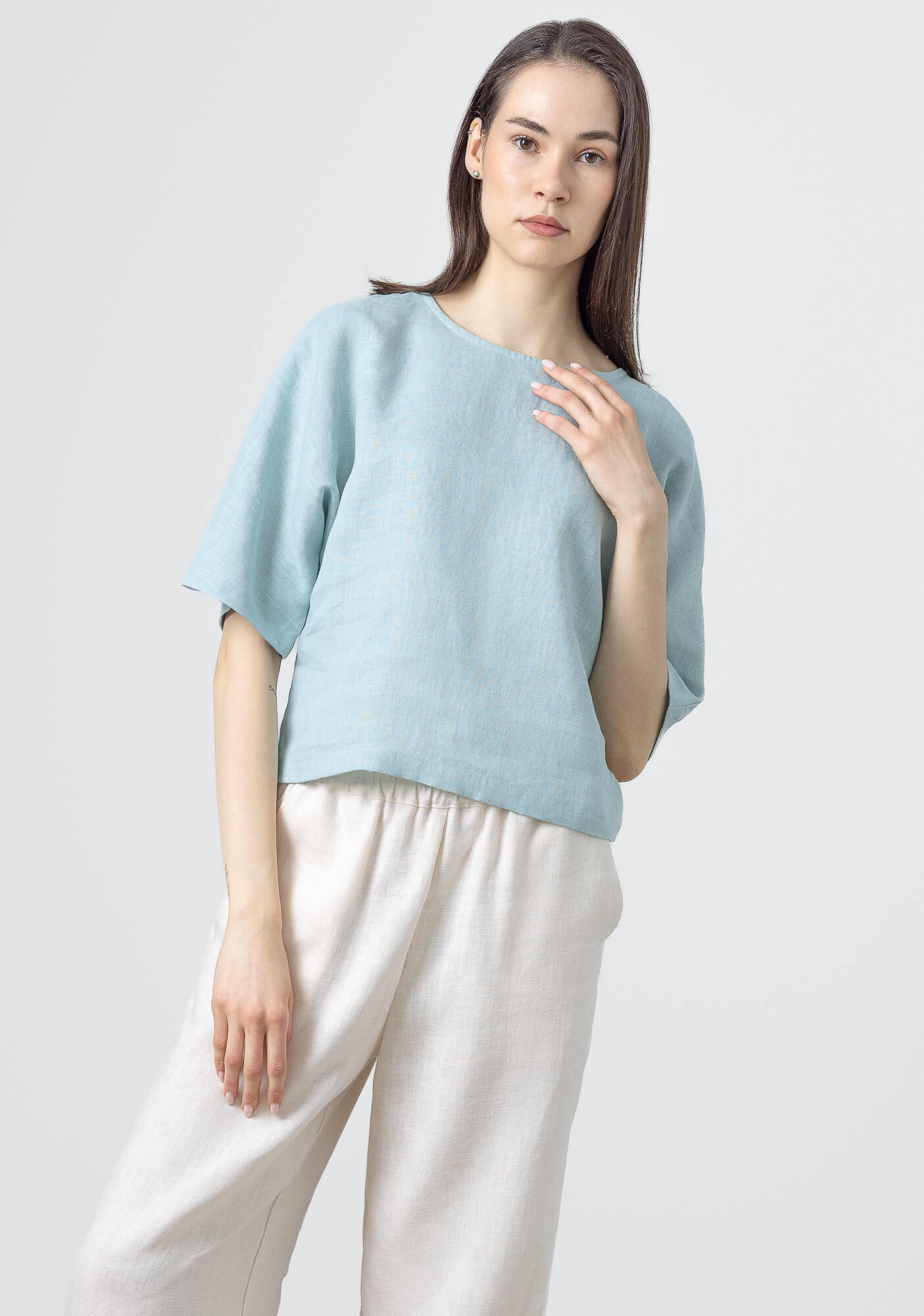 Relaxed fit linen blouse with wide sleeves and breathable fabric