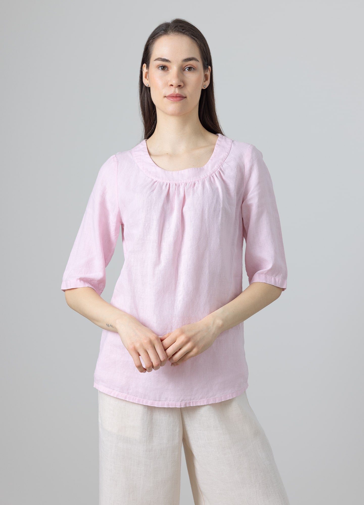 Handmade pink linen blouse styled with wide-leg trousers – breathable and elegant linen shirt for women