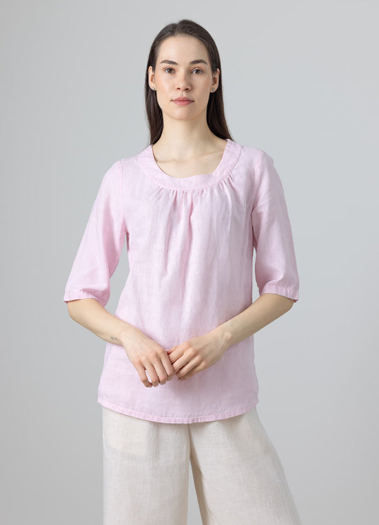 Handmade pink linen blouse styled with wide-leg trousers – breathable and elegant linen shirt for women