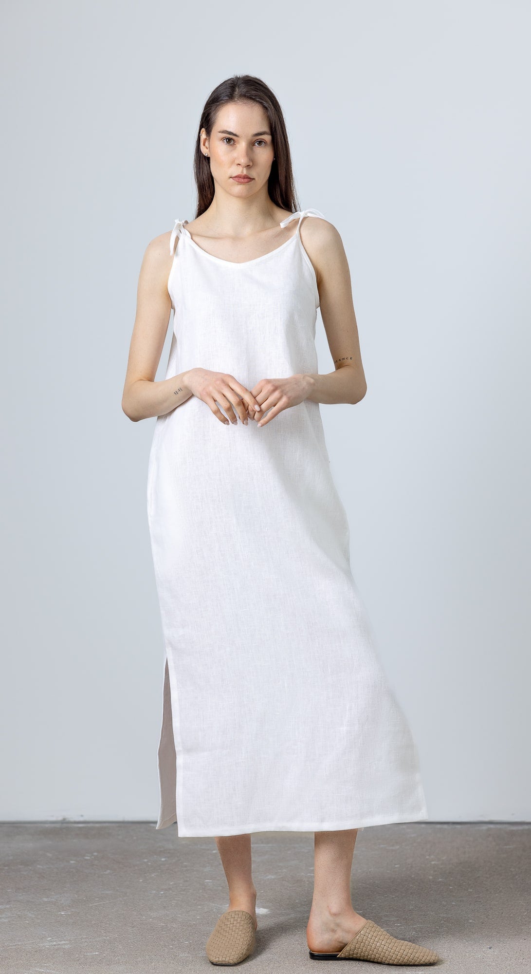 Timeless styling of MINIMALISTICLINEN White Linen Slip Dress Monserrat evokes the pure ease of white linen dresses and modern minimalism