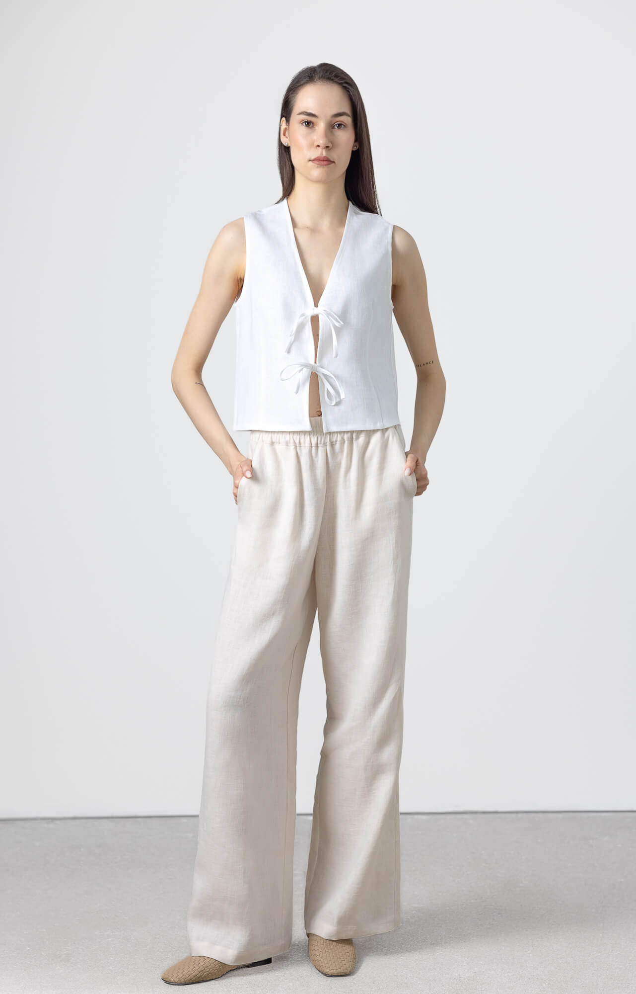 Women's breathable linen wide leg pants with side pockets, relaxed fit and timeless minimalist design crafted from OEKO-TEX certified linen