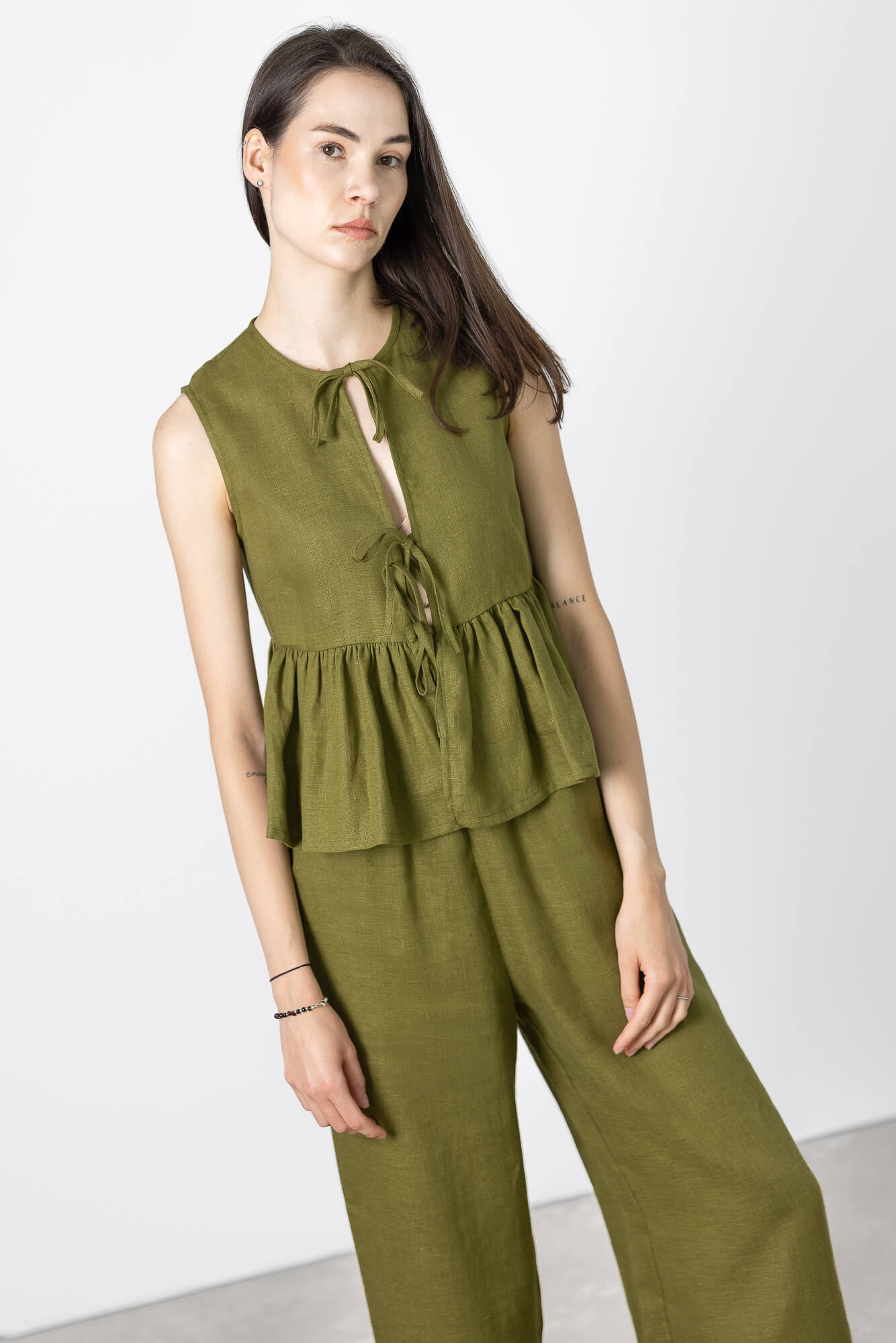 Handmade European linen vest designed with adjustable front ties and breathable fabric