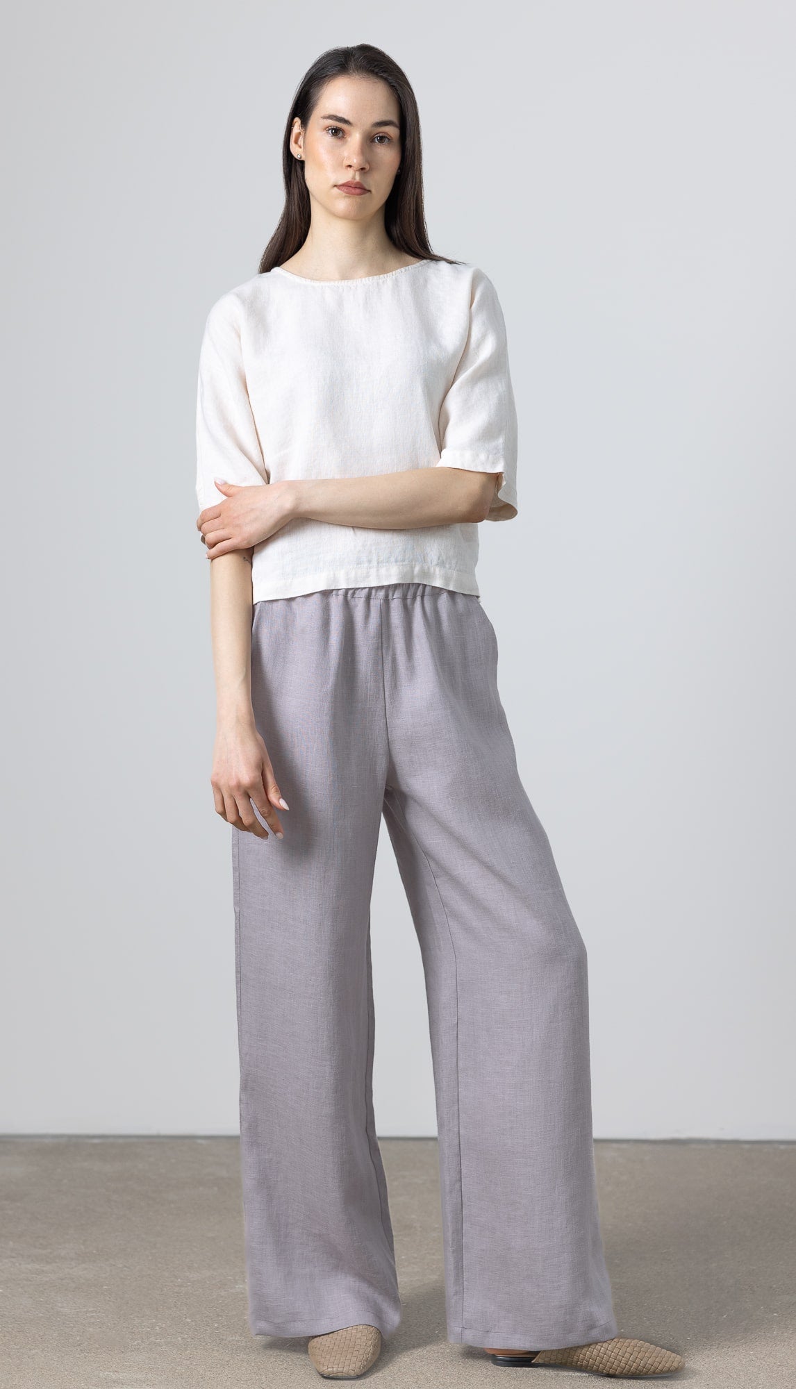    Women’s minimalist linen outfit featuring Petite Women Linen Pants Rosaire, wide leg design in soft natural grey linen