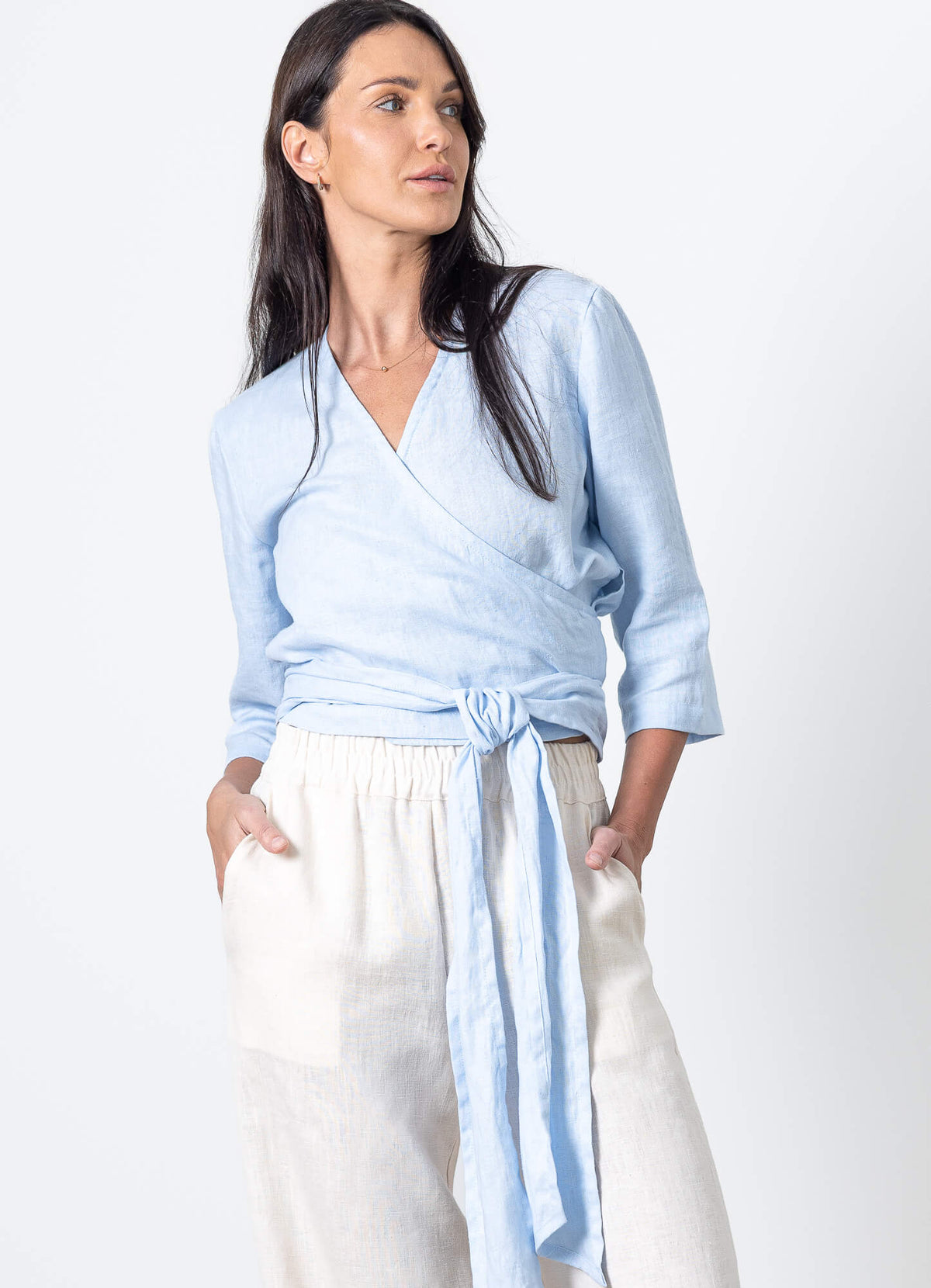 Blue linen wrap top Esmeralda by Minimalisticlinen, elegant womens linen wrap blouse with tie waist