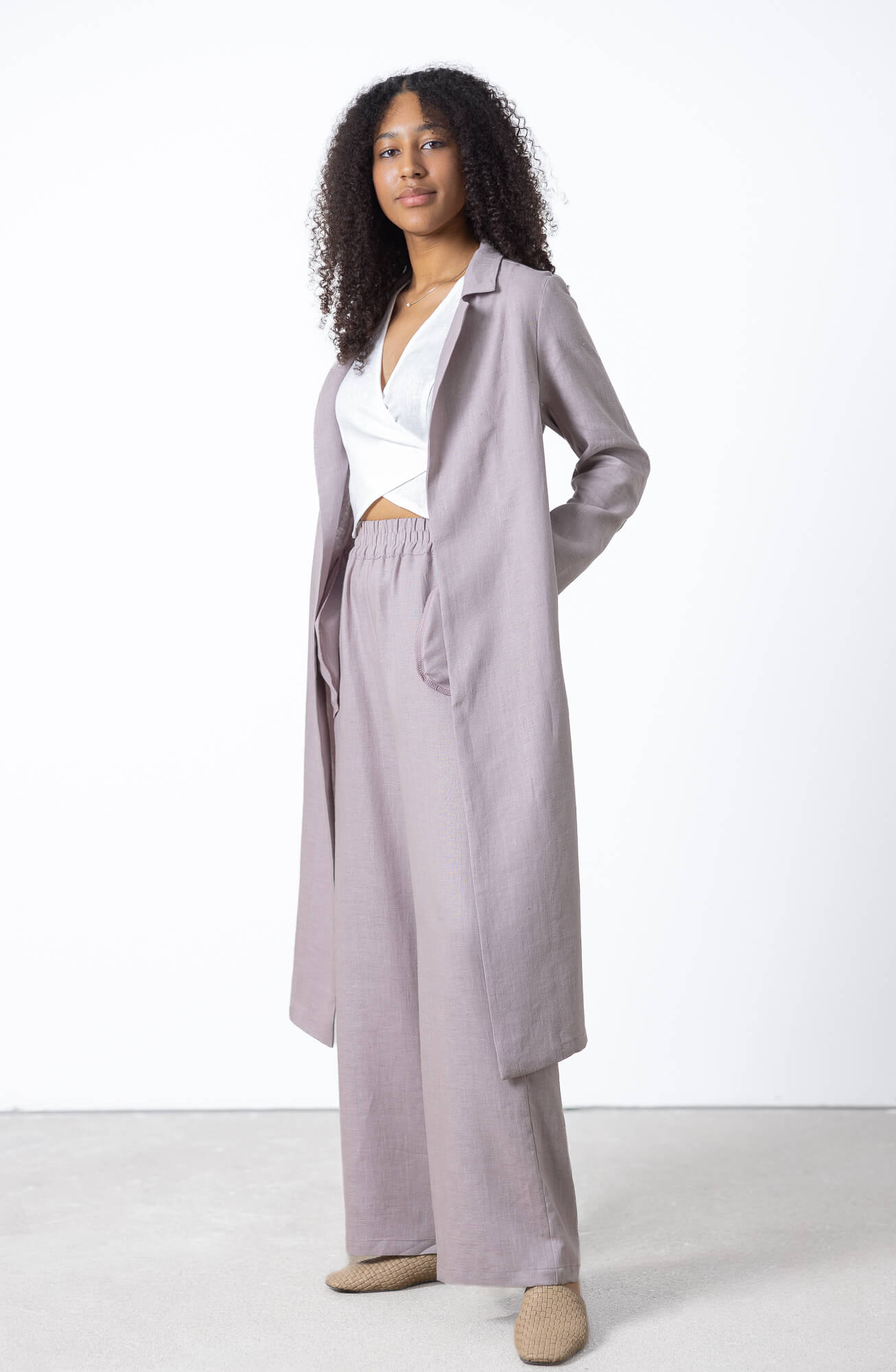 Casual long linen jacket styled with linen trousers and wrap top