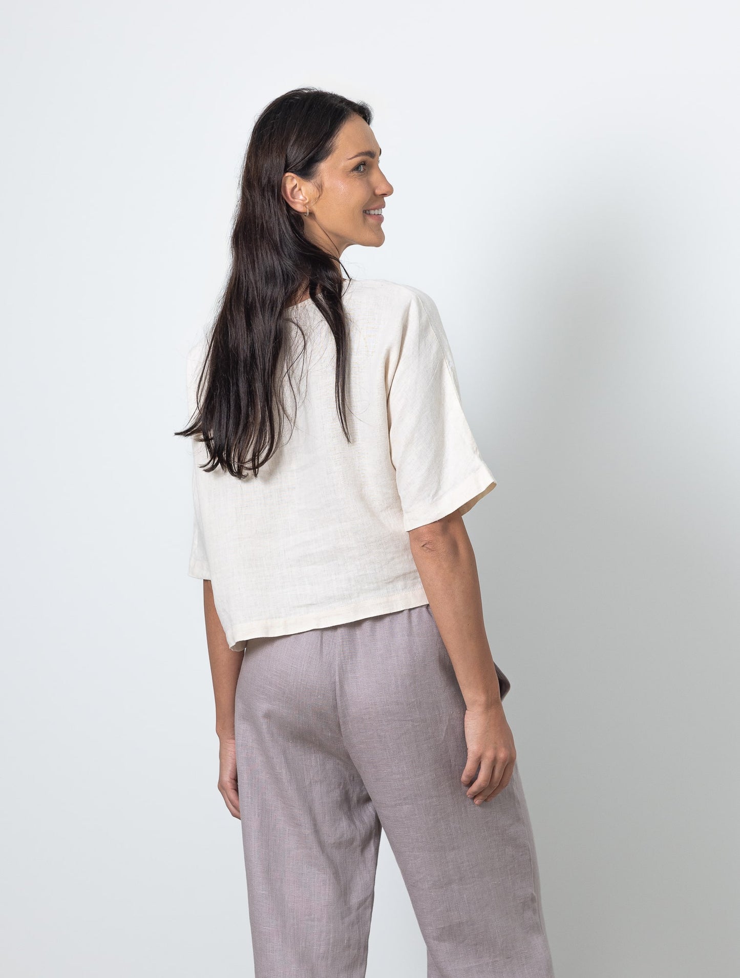 Back view of MOLLY cropped linen top and wide leg linen trousers, breathable natural outfit