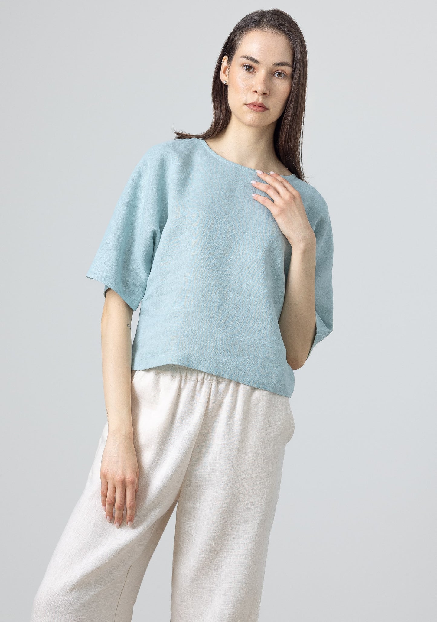 Light blue linen cropped top – casual short-sleeve blouse for women’s capsule wardrobe