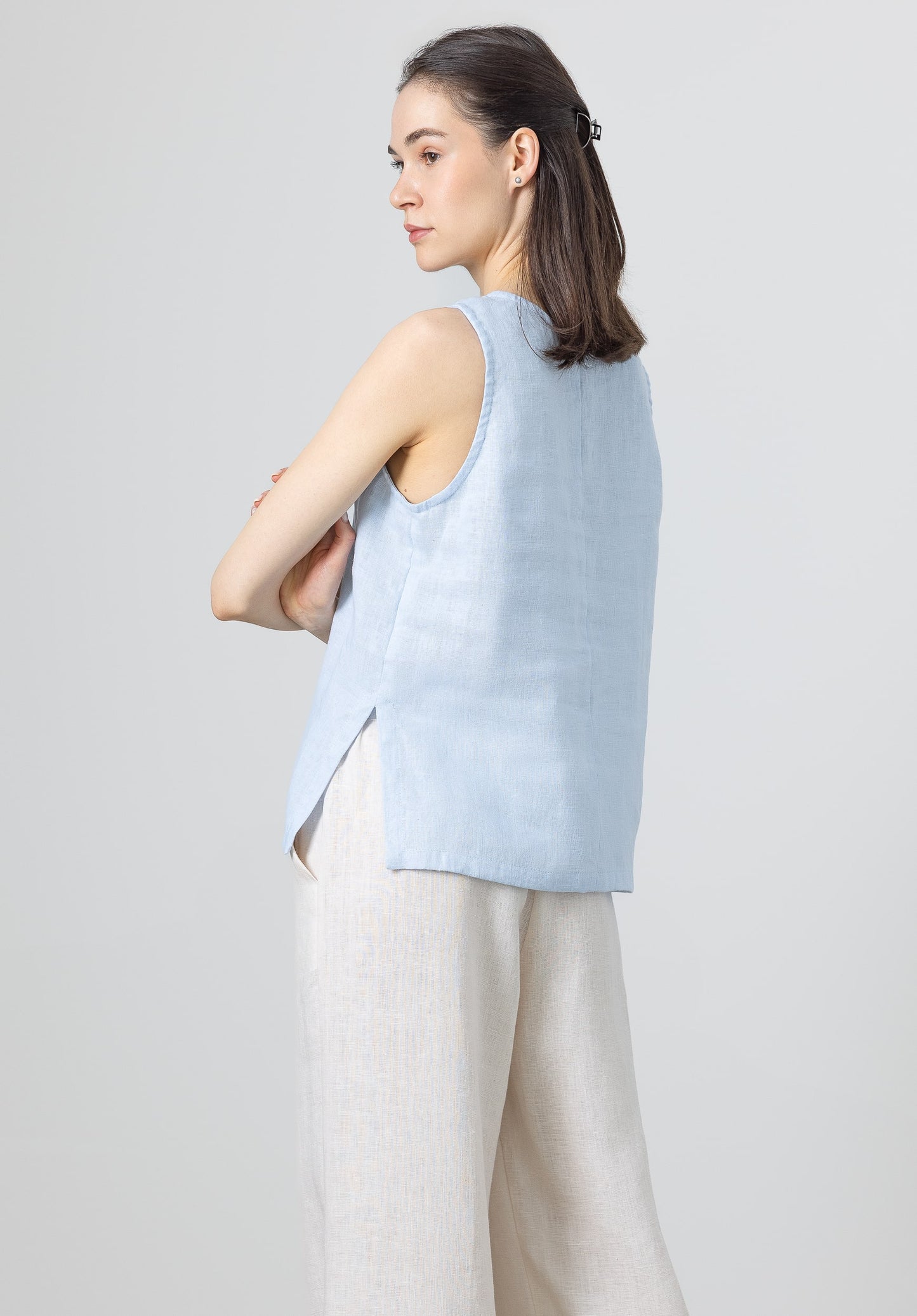 Light blue linen top back view – sleeveless summer blouse for women