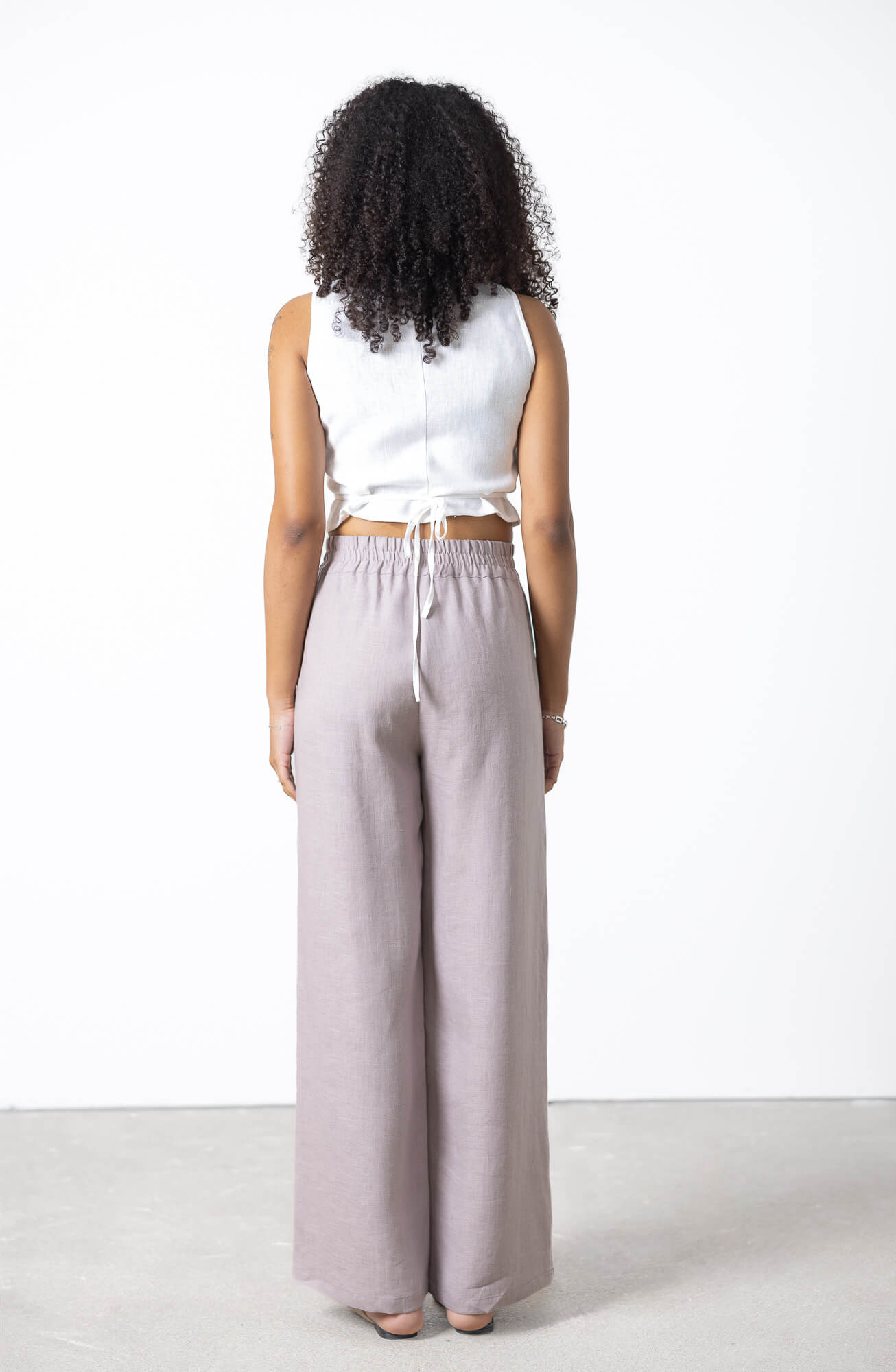 Lightweight linen palazzo trousers perfect for warm weather and everyday wear