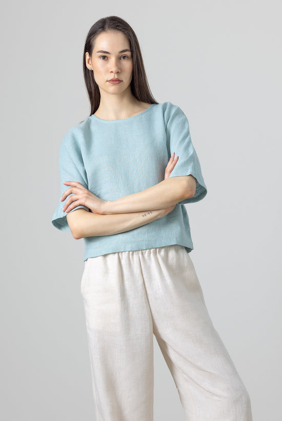 Linen cropped top in pastel blue – relaxed short-sleeve blouse for women