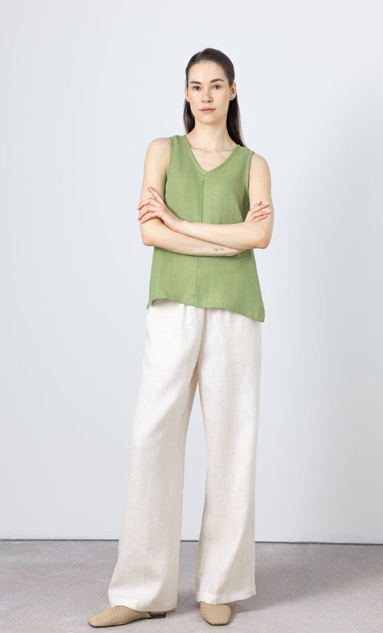 Linen sleeveless blouse in green – minimalist women’s summer top