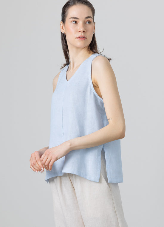 Linen sleeveless blouse in light blue – minimalist women’s summer top