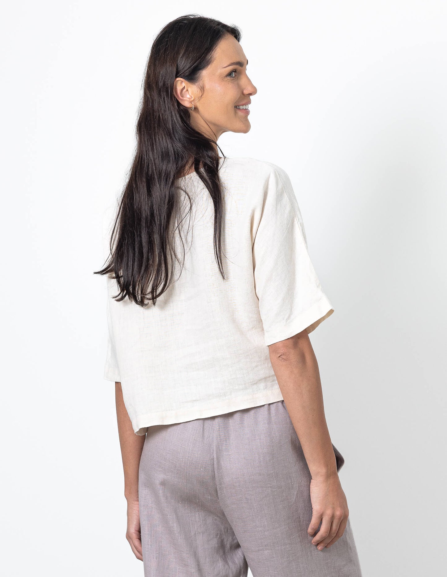 Back view of Linen Cropped Top Molly by Minimalisticlinen, minimalist natural linen cropped blouse for women