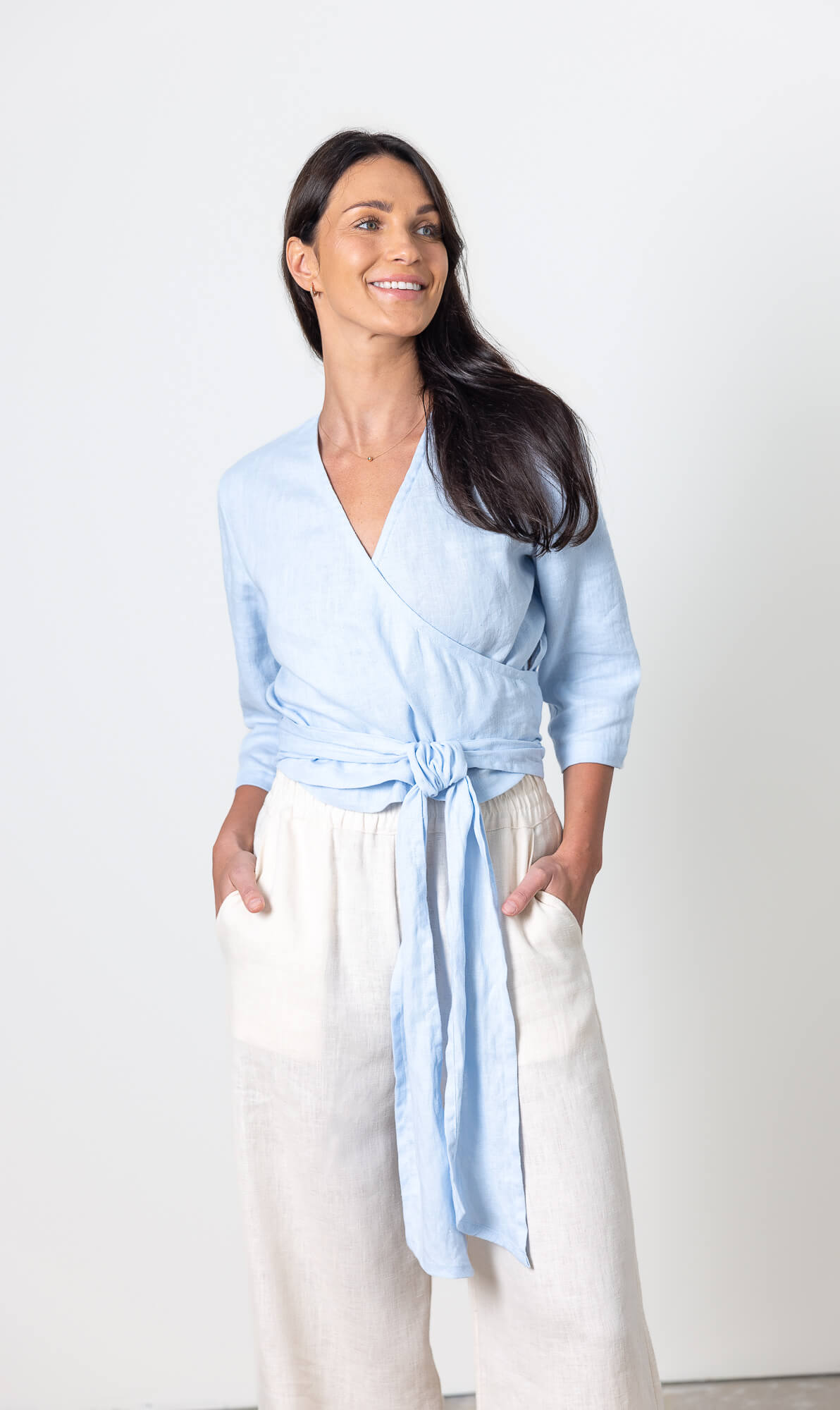 Blue linen wrap blouse Esmeralda by Minimalisticlinen, breathable womens linen wrap top with waist tie