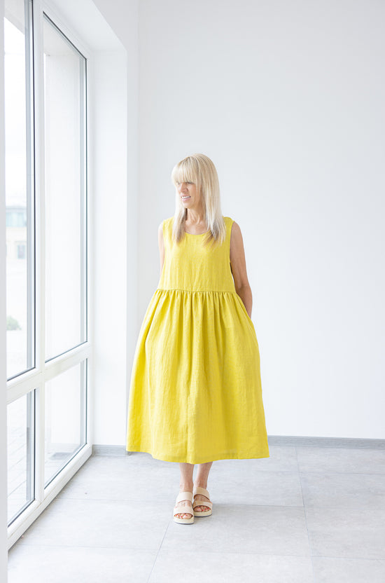 Yellow linen dress with pockets. Minimalist style sustainable ruffle dresses MinimalisticLinen Yellow linen dress with pockets. Minimalist style sustainable ruffle dresses MinimalisticLinen